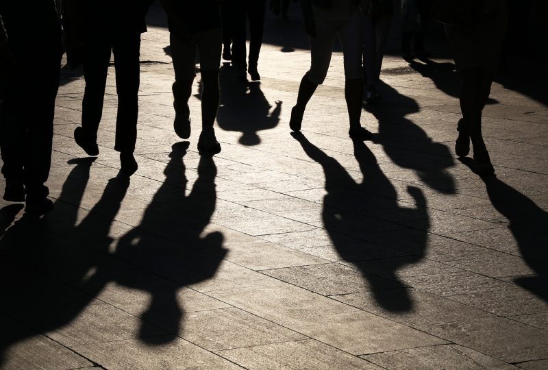 shadows of people walking